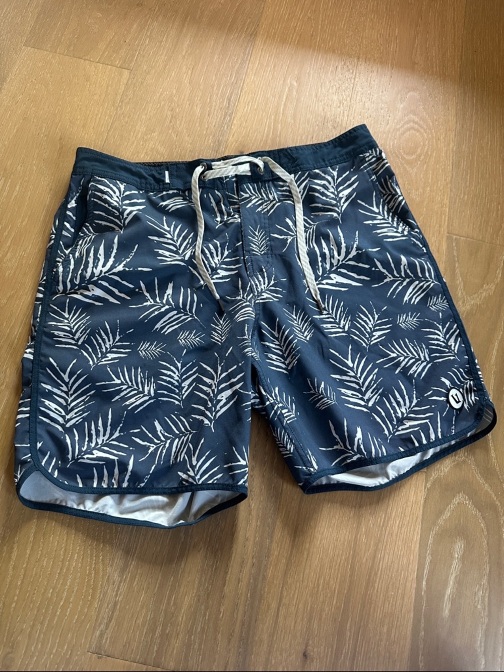 Vuori Navy and White Palm-Print Swim Trunks